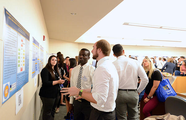 Student Presenting Poster
