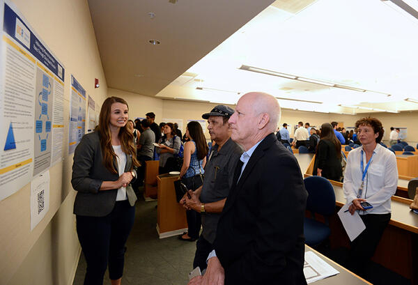 Student Presenting Poster