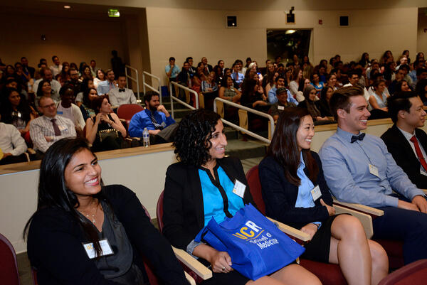 Students watching presentations